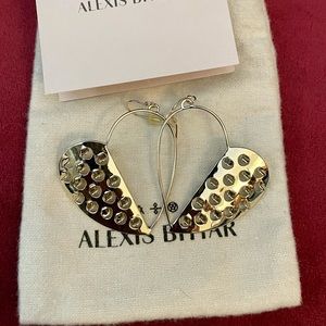 Never worn heart grater earrings.